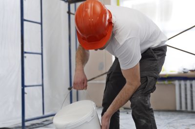 full-shot-man-pouring-paint (1)